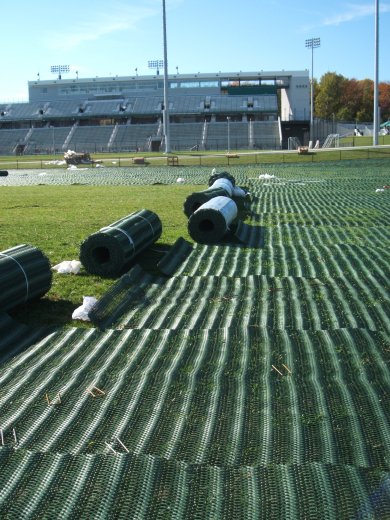 GrassProtecta grass reinforcment mesh being installed for stadium parking