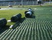 GrassProtecta grass reinforcment mesh being installed for stadium parking