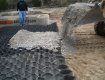 Geocell structure being filled