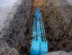 TYPAR DetectaMesh installed over a water pipe