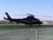 Helicopter landing on a TYPAR GrassProtecta Helipad