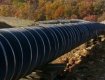 Plastic mesh protection for pipelines anto-corrosion coatings in rocky backfills